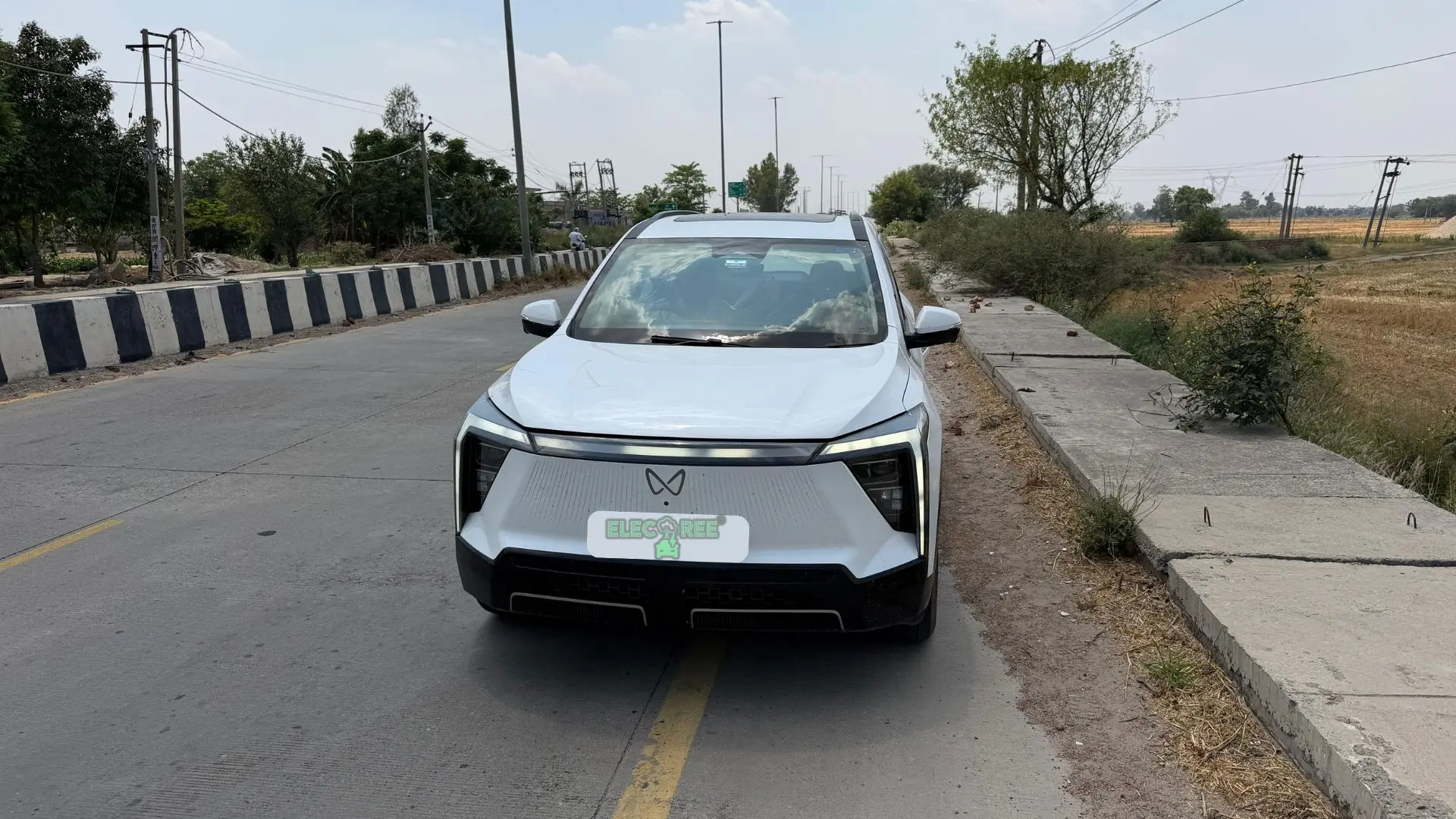 Sehajpreet Singh's White Mahindra XEV 9S on a Road Trip