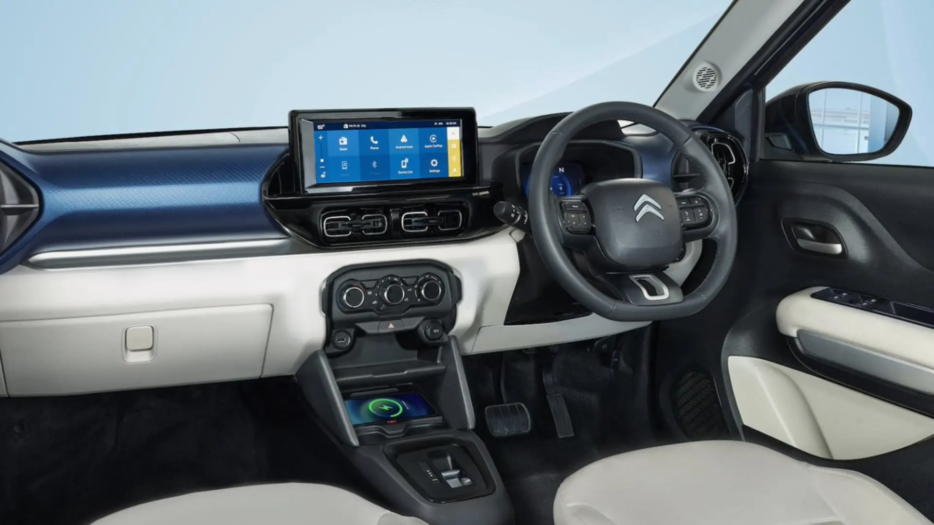The ë-C3X features a refreshed cabin with Electric Blue accents, premium leatherette upholstery, a new 7-inch TFT digital cluster, a 10.25-inch touchscreen infotainment system with wireless Apple CarPlay and Android Auto, a wireless charger, and a premium JBL audio system.