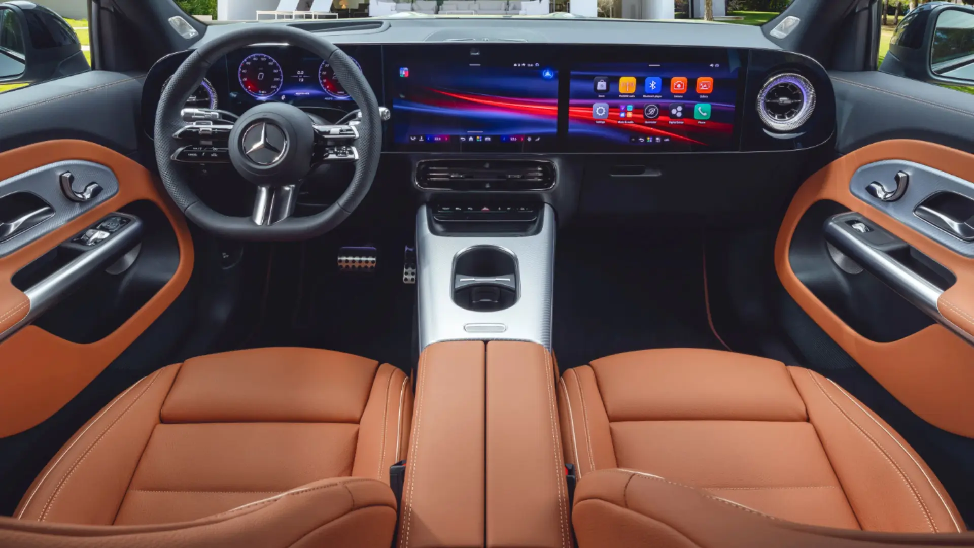 The MBUX Superscreen setup includes a 10.25-inch driver display, a 14-inch central touchscreen, and a dedicated screen for the front passenger.