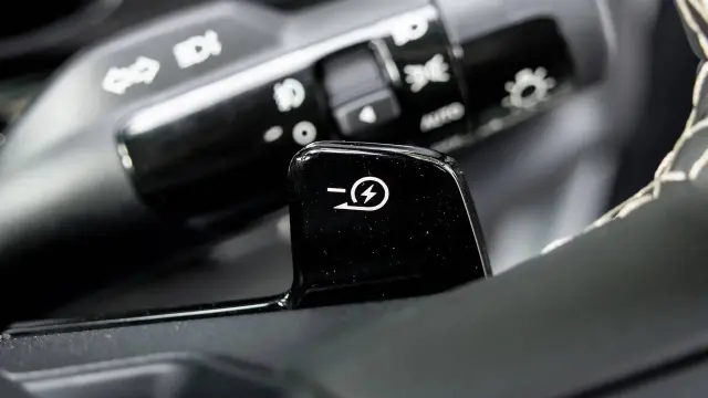 Kia Syros EV interior - Regen Paddle Shifter: Down - image