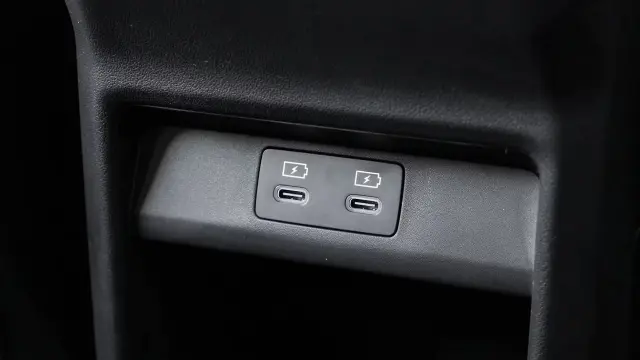 Kia Syros EV interior - Rear Mobile Charging Port - image