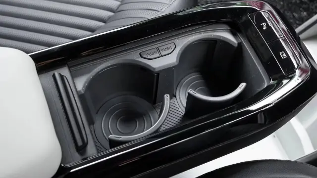 Kia Syros EV interior - Front Cup Holders - image