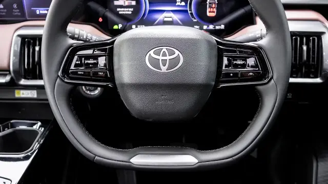 Toyota Urban Cruiser Ebella interior - Steering Wheel with Mounted Controls - image