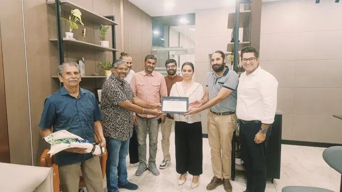 George Varghese and his father being felicitated by Mahindra following their long-distance BE 6 journey to the Ladakh region.