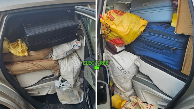 Anoosh folded the rear seat to fit in the excess luggage.