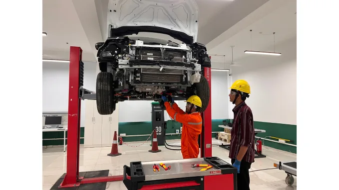 Hands-on vehicle testing and powertrain diagnostics inside the new Electric Vehicle Center of Excellence