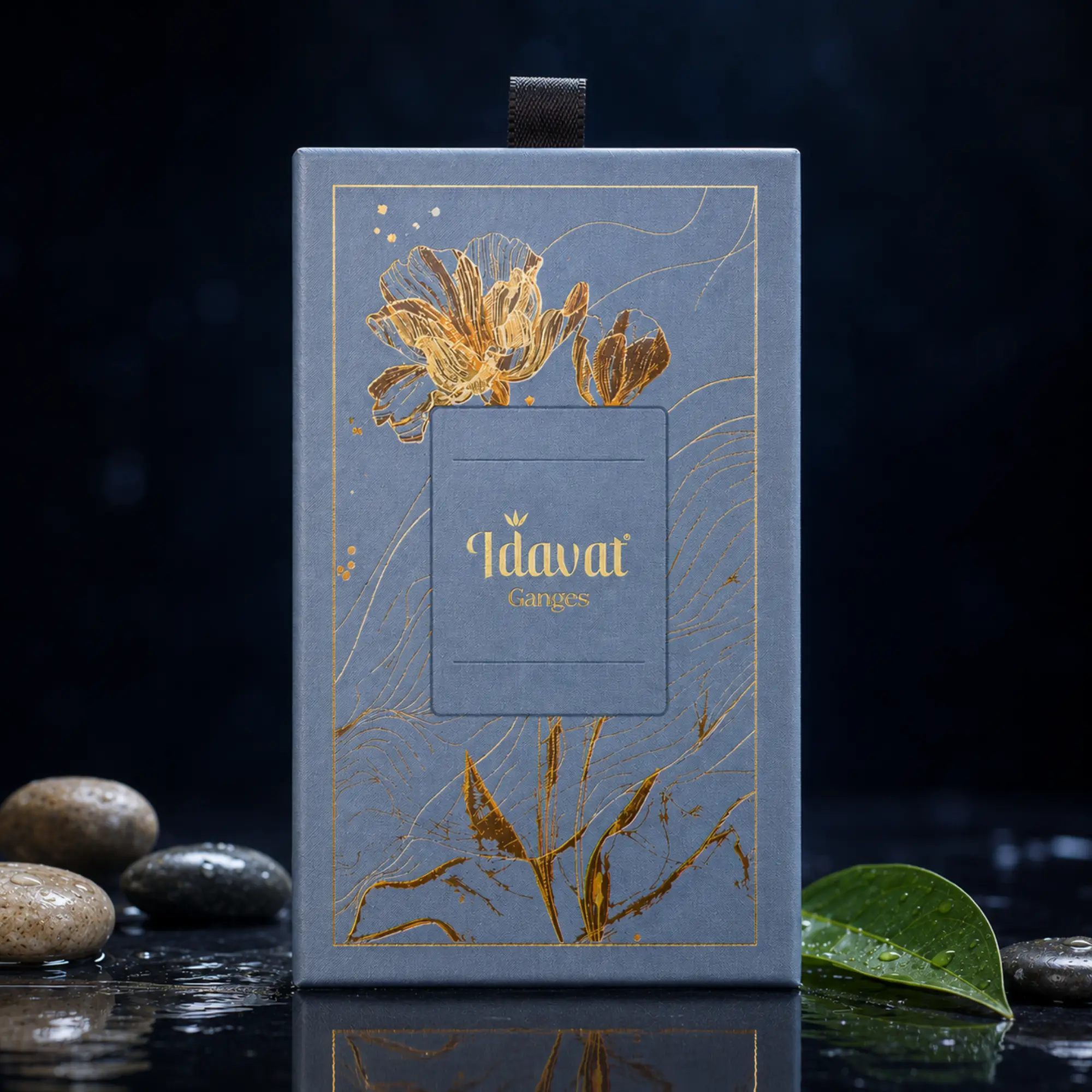 Idavat Ganges premium aquatic car fragrance box front view with gold floral artwork on dark aquatic background